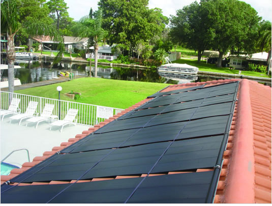 picture of solar pool panels on tile roof