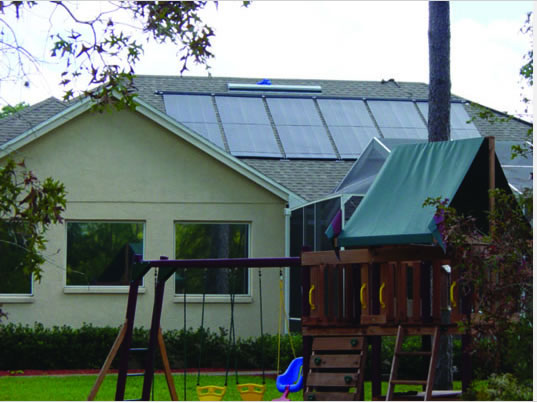 pool solar panels mounted om house