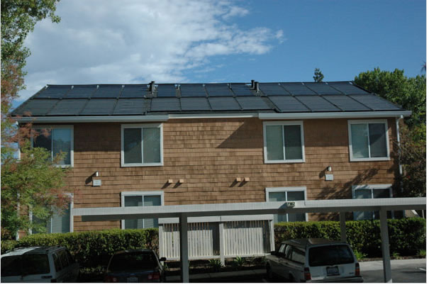 image of solar panels for pool heat installed on 2 story house